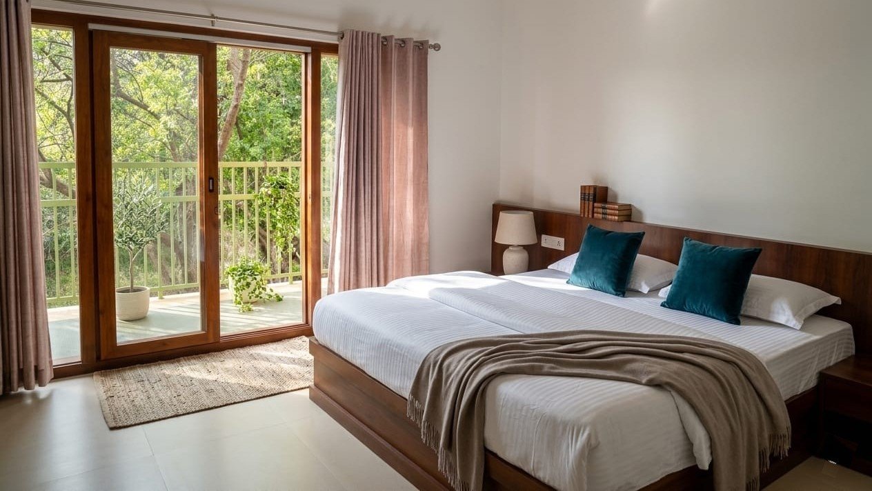 Bedroom with nature view at Seetharkundu Resorts, Kollengode
